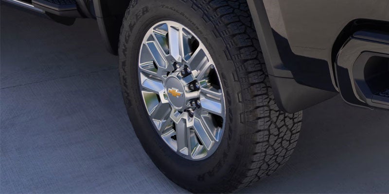 Close-up of pickup truck wheel and tire